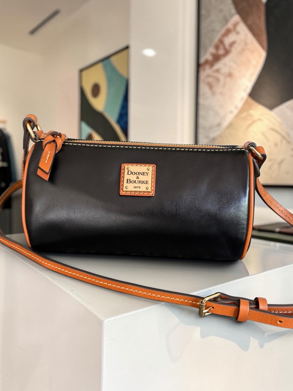 Dooney & Bourke Buffy Crossbody Black with Tan Trim Leather Barrel Crossbody - Picture 8 of 16